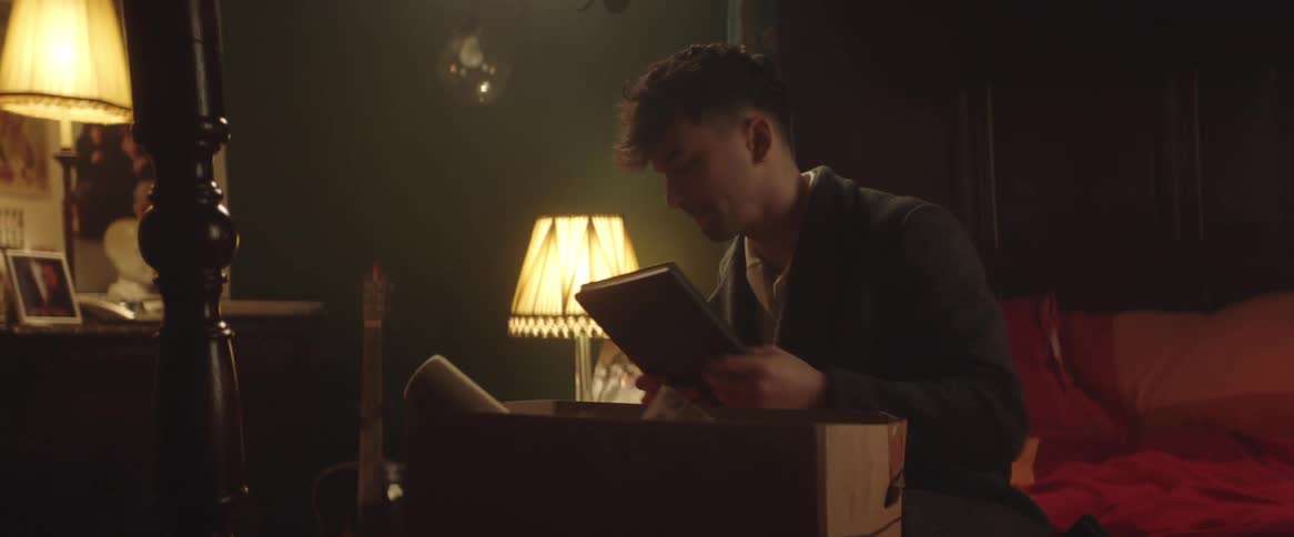 A man is packing a box