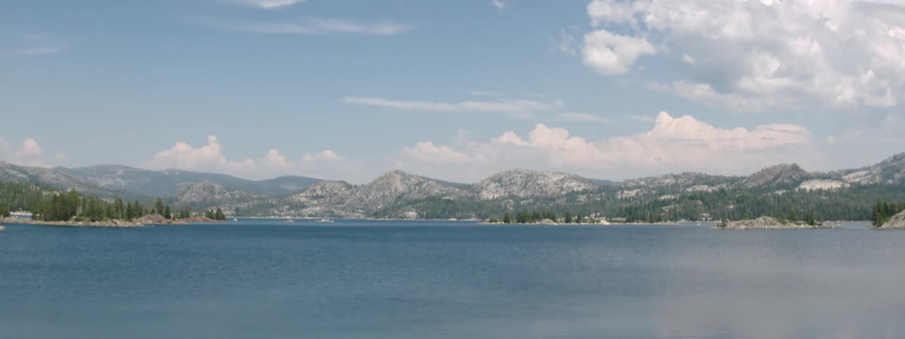 The lake is before the mountain range