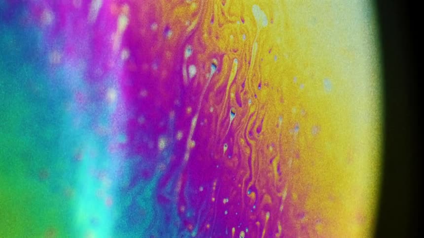 A colorful sphere with liquid moving throughout it