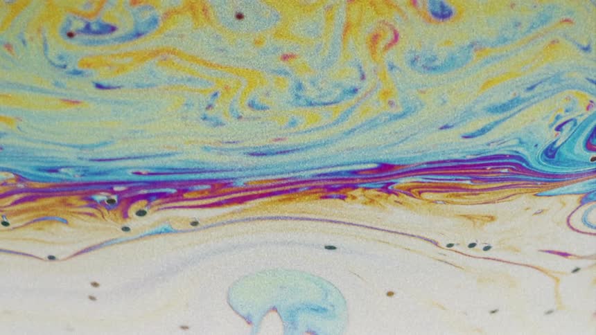 Multicolored layers swirl and flow