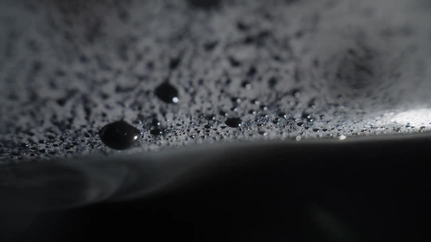 Drying liquid beads on surface and releases vapor