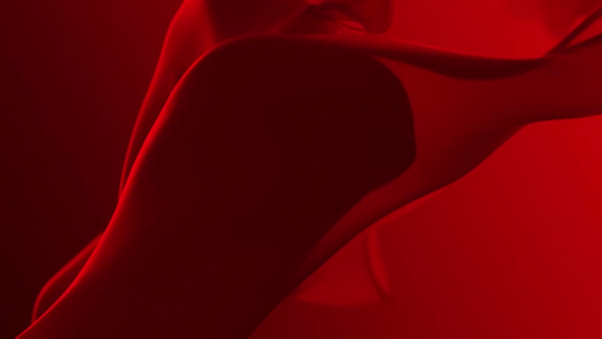 An abstract computer generated special effect looks like a swirling red liquid