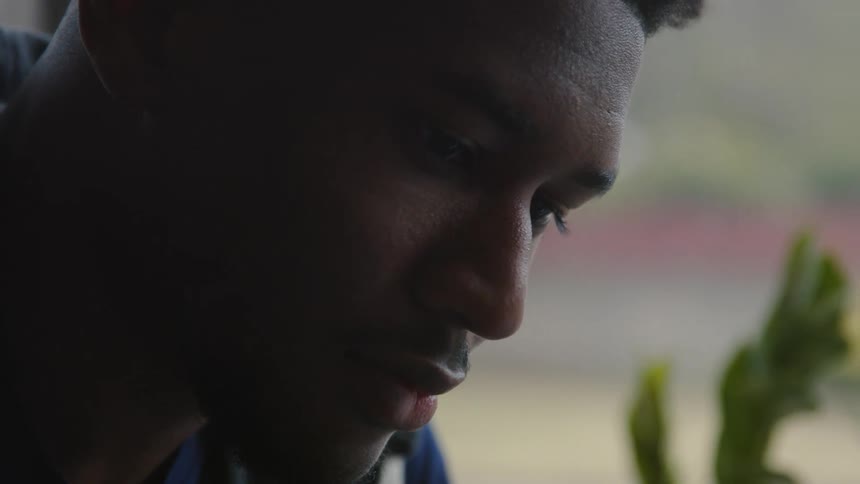 A close up portrait of a mans face