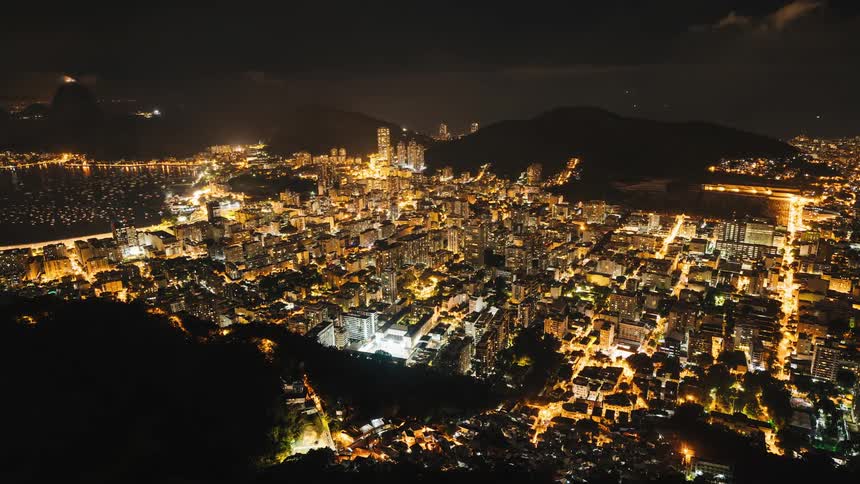 The city is brightly lit at night