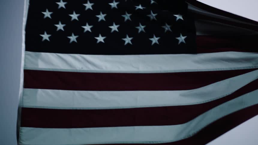 Someone waves a flag