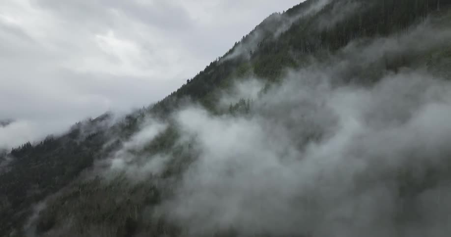 Fog and mist is covering the mountainous landscape