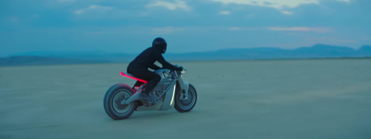 A person is racing through the desert