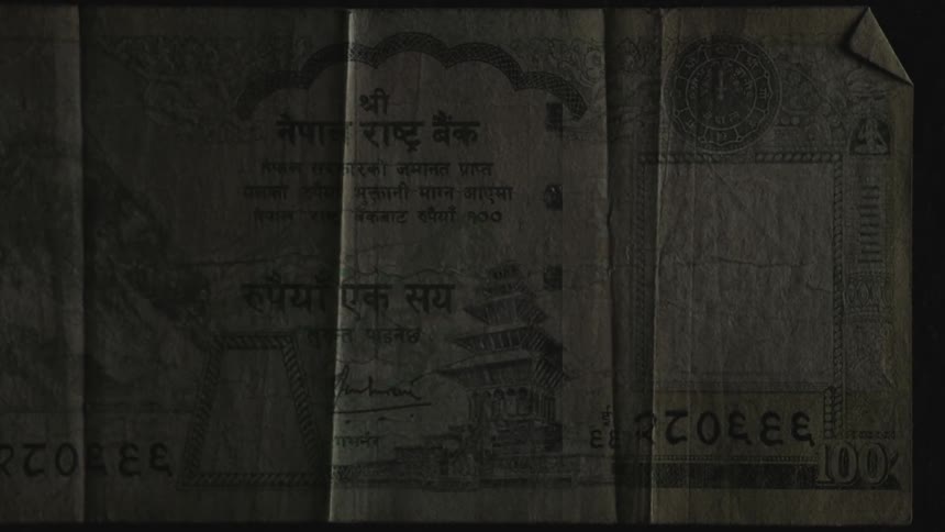 Old newspaper hanging on a wall