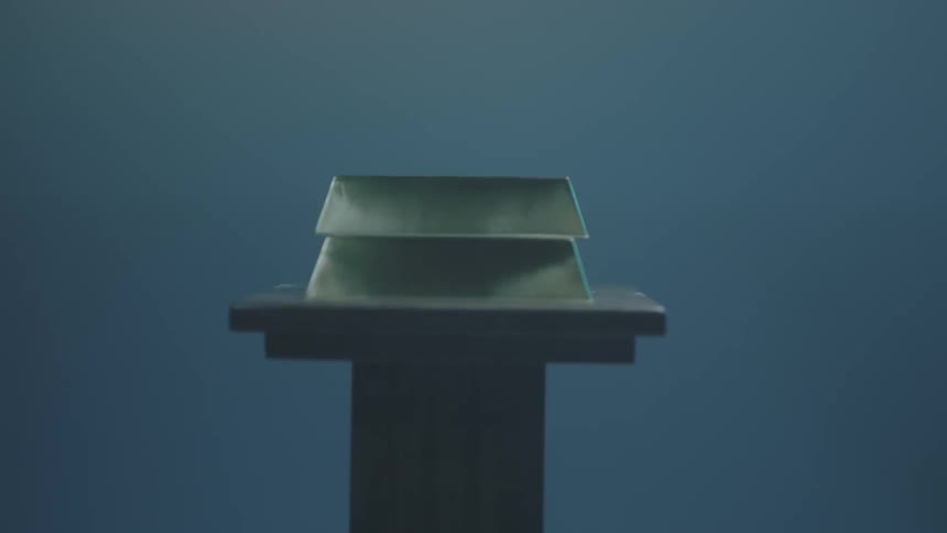 Blocks of metal on a pedestal