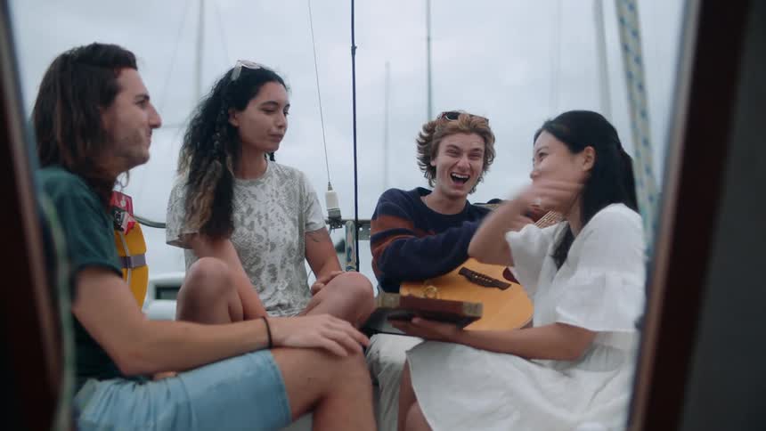 Friends talk on the boat