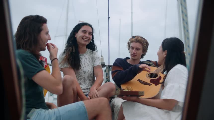 Friends talk on the boat
