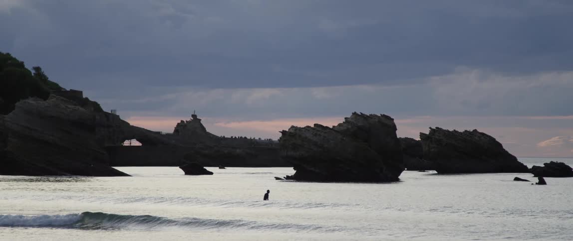 A person is floating off the coast