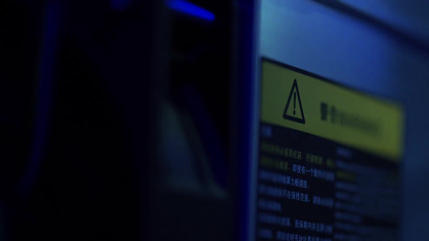 Close up of warning sticker on device