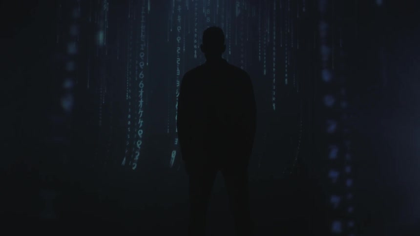 Lines of code rain down a wall