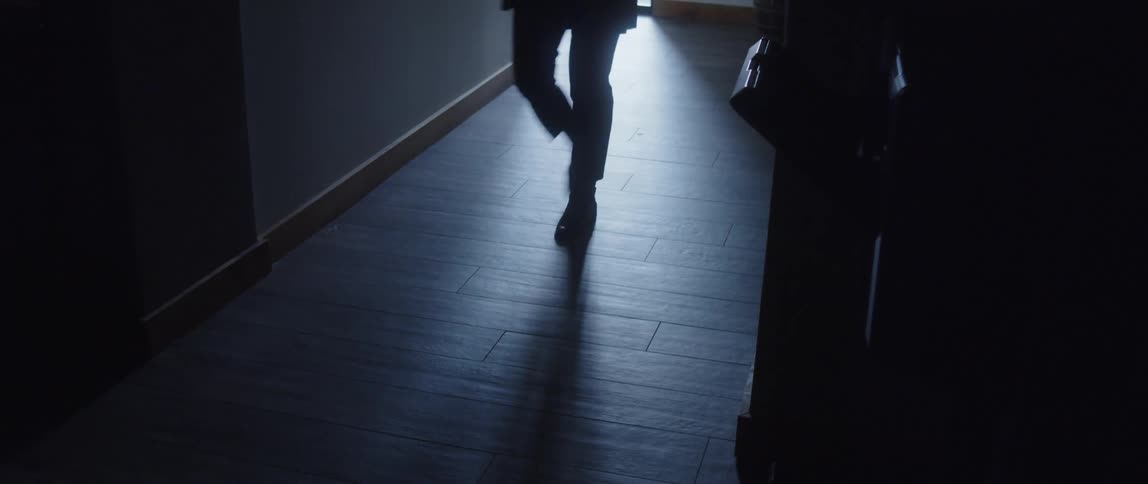 A person walking into then out of frame