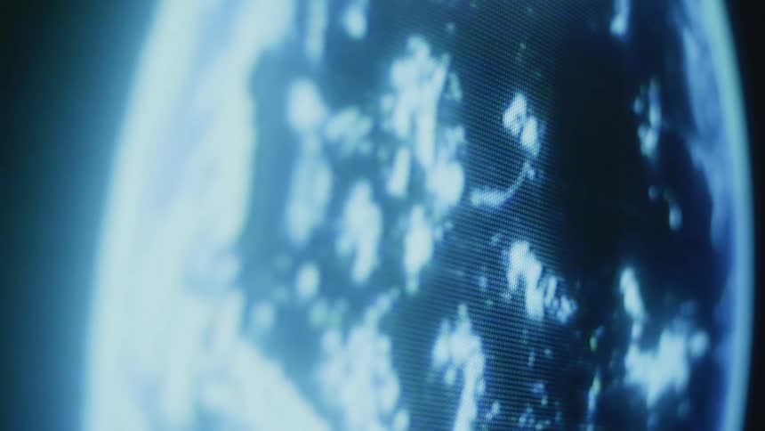 Close up view of a globe on an electronic monitor is displayed