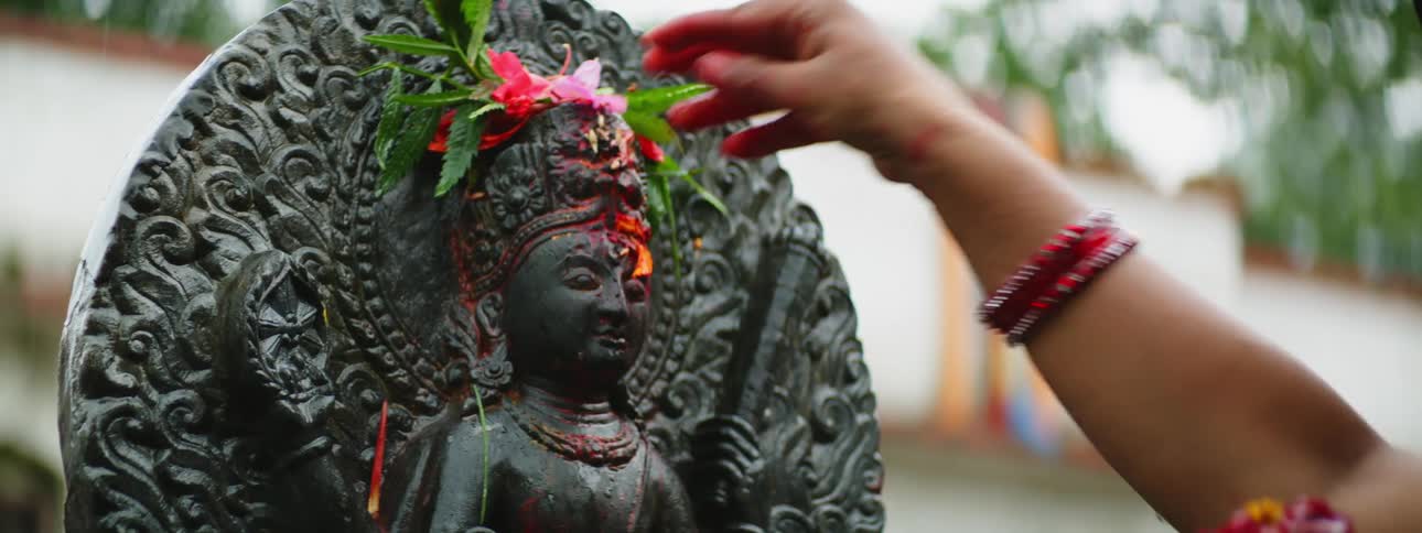 Rainy Day Buddha Statue Painting by Woman