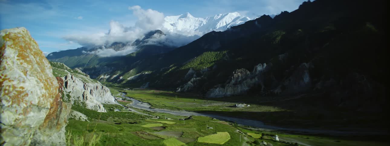 Aerial view of mountains during spring is displayed