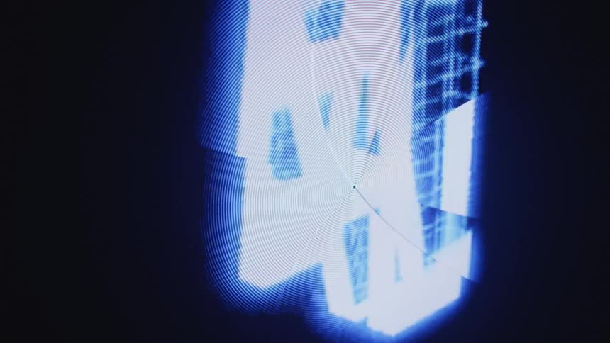 Letters flash on a computer monitor