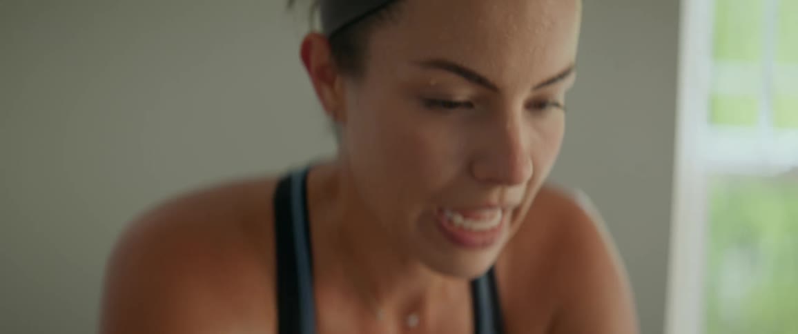 A woman exercising at home