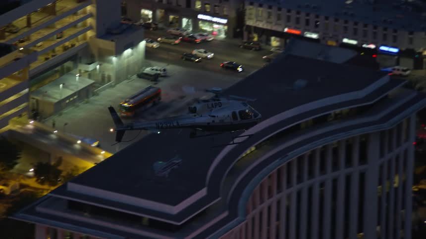 A LAPD helicopter is tracked during twilight in Los Angeles California