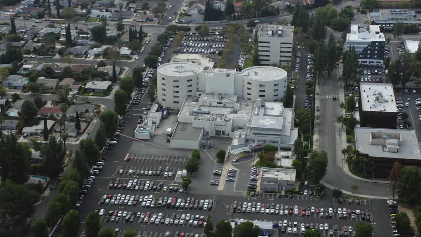 Aerial footage of the West Hills Hospital complex in California on a cloudy day