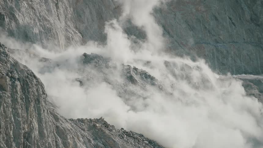 The rocks are detonated causing an avalanche