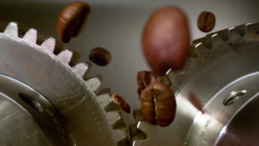 An engine in action as it slices through coffee seeds the first step in the coffee processing journey