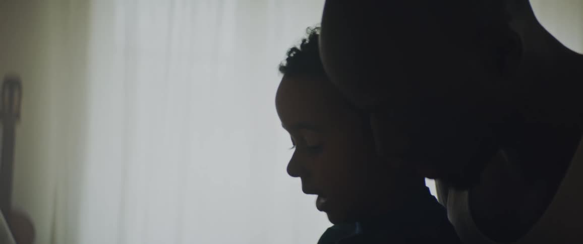 A man is talking to his son