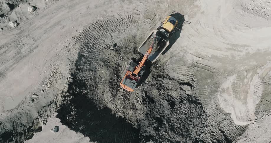 Aerial view of a construction site is displayed