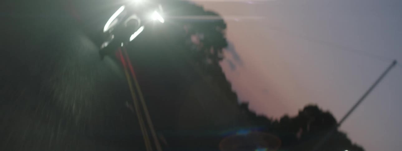 A man on a bike speeding through the neighborhood