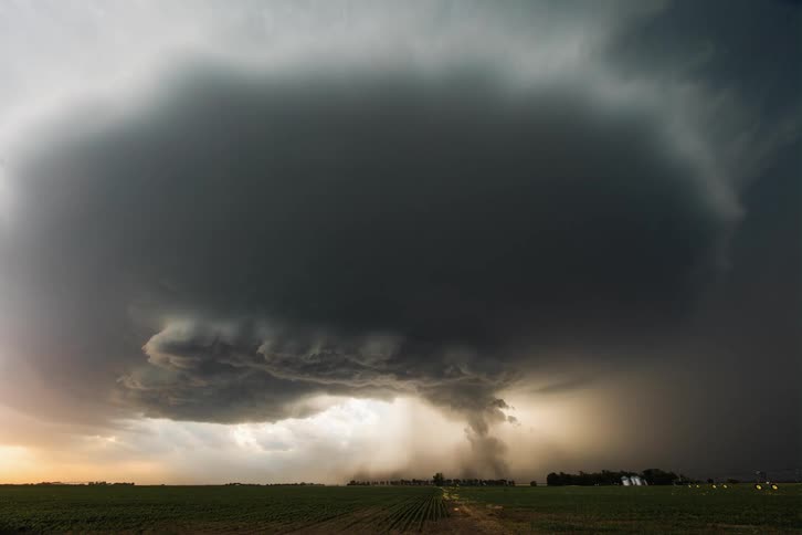 Time lapse view of a tornado is displayed at dusk