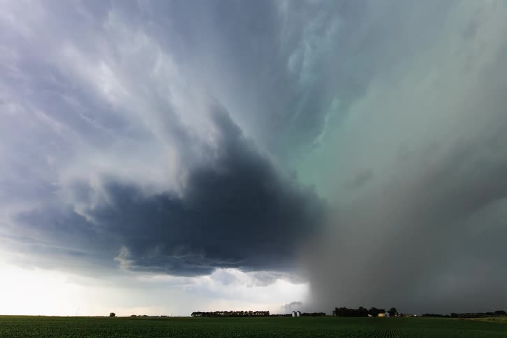 Landscape of thunderstorm and clouds floating and gathering over a field