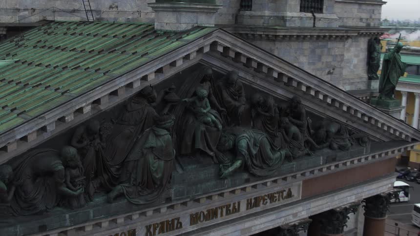 An incredibly detailed carving is seen on the exterior of a landmark building