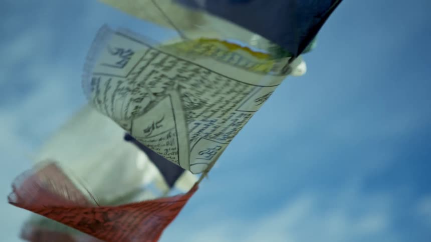 Small flags hang from the line