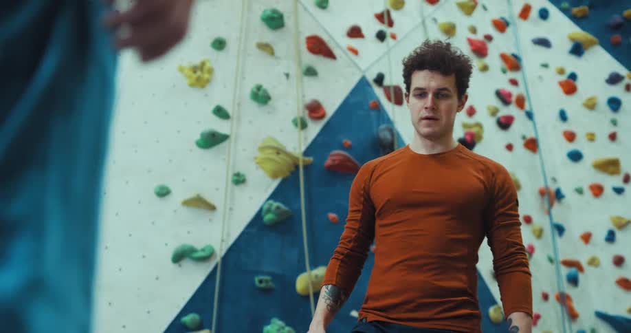 Two men doing some sport in an art hall