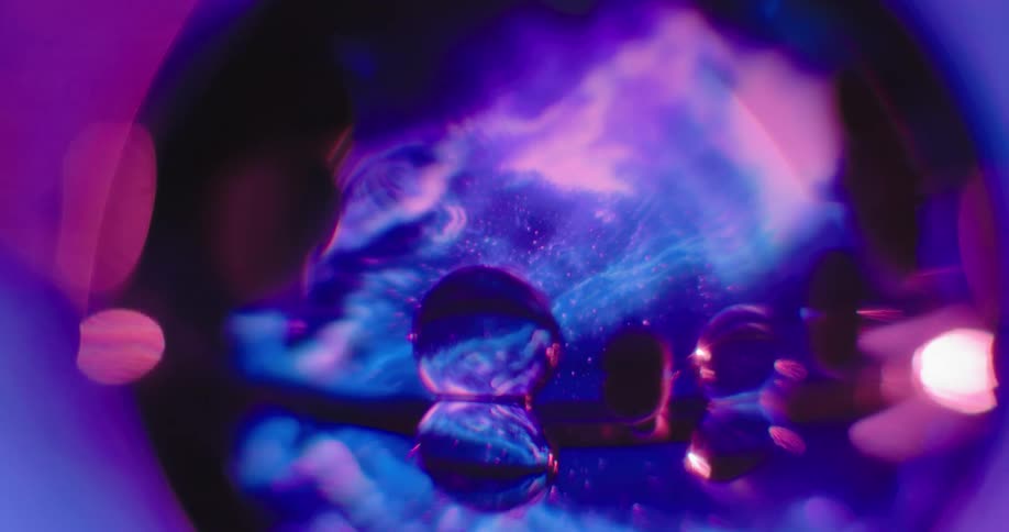 Droplets of a viscous substance appear under a microscope