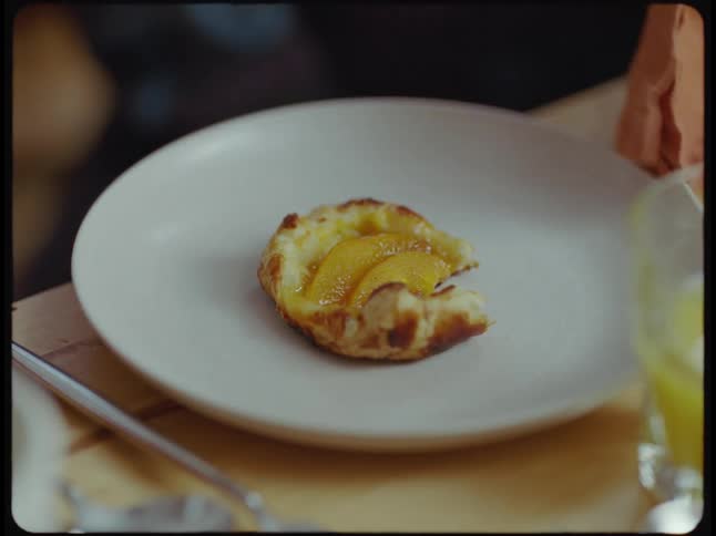 Food is being put on a plate during mididay