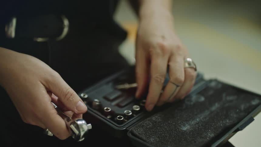 A person tinkering around with a toolset