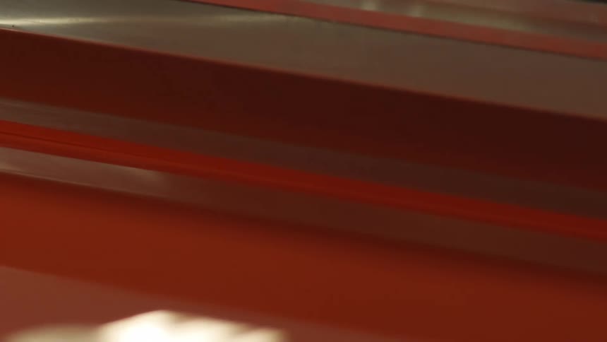 A machine spreading ink or paint