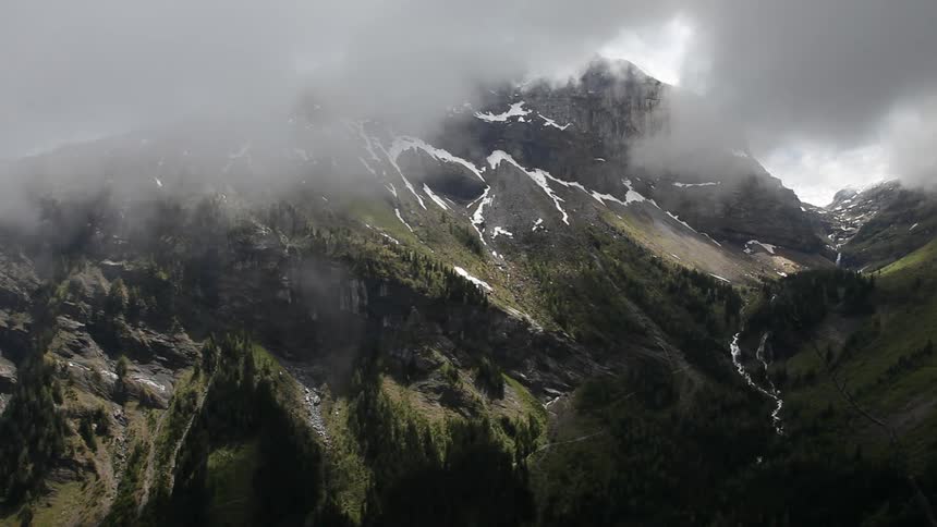 Clouds cover a mountain top