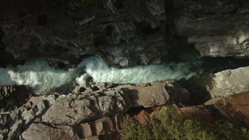 A river rushing through a canyon