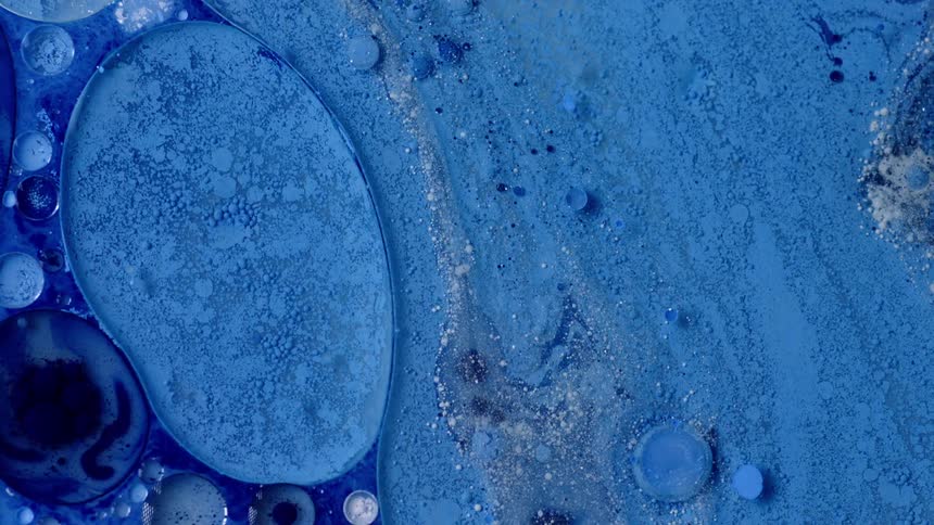 Blue paint bubbled and swirling around