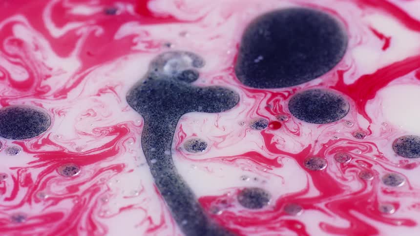 The red and black ink mix together