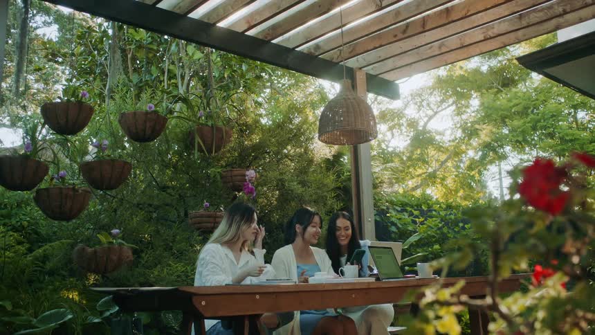 Friends talk in their yard