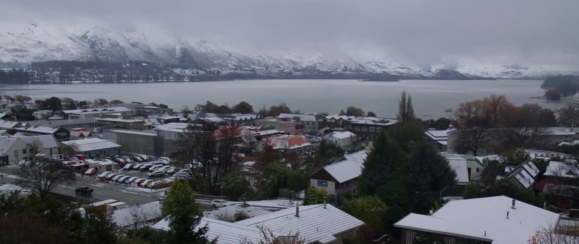 The view is of the town area around the winter time