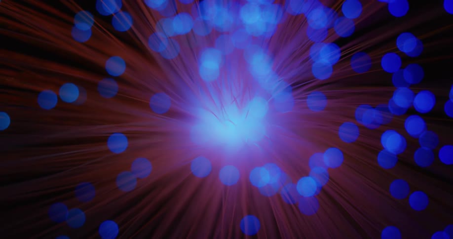A laser light with multi color spokes rotating around