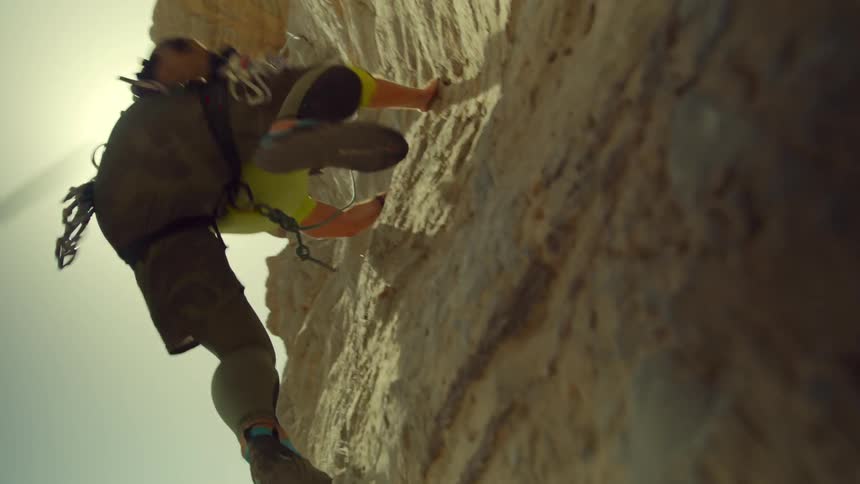 A man is mountain climbing