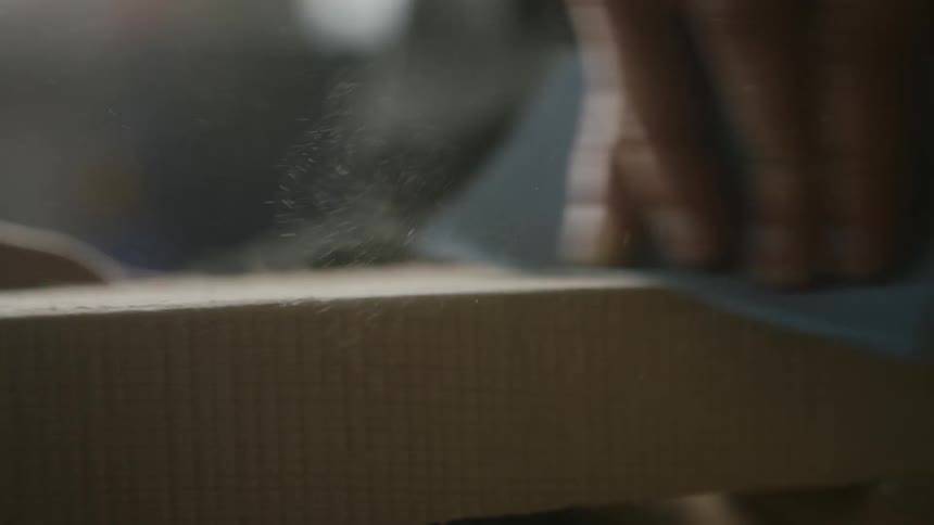 An employee is working at the factory in the day time