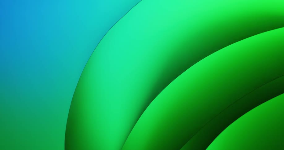 Light shines on a shiny rounded green object as it slowly moves and changes to aqua blue